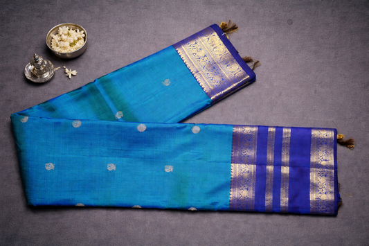 Elegant Blue Kanchipuram Silk Saree with Gold Zari Motifs and Royal Blue Border