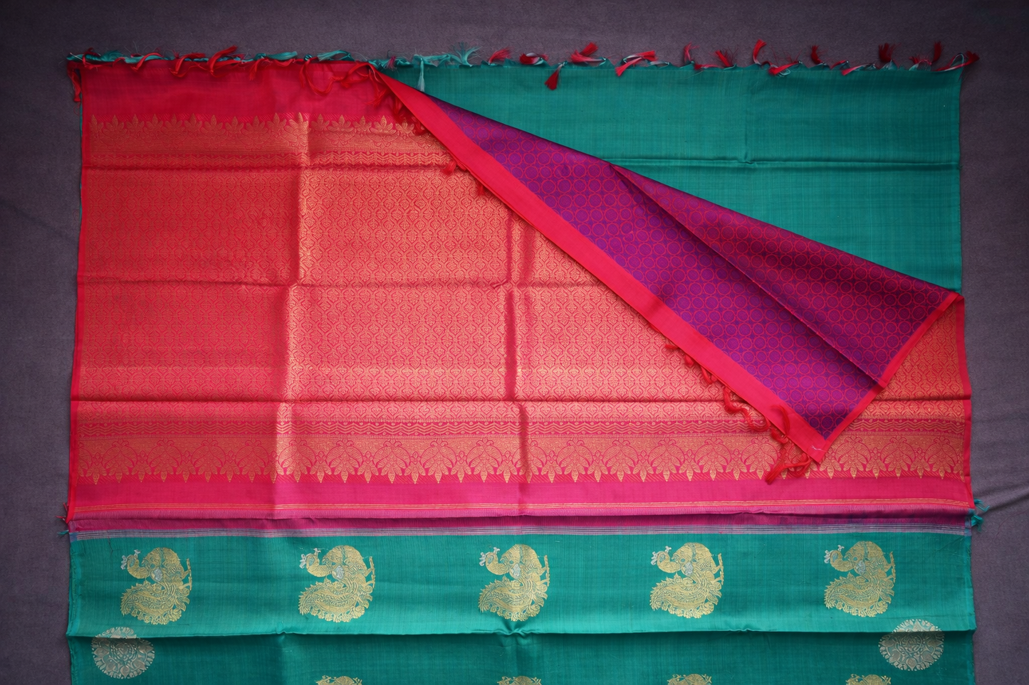 Vibrant Red Silk Saree with Teal Green Border and Gold Zari Motifs