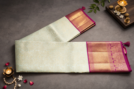 Pastel Mint Silk Saree with Magenta Zari Border