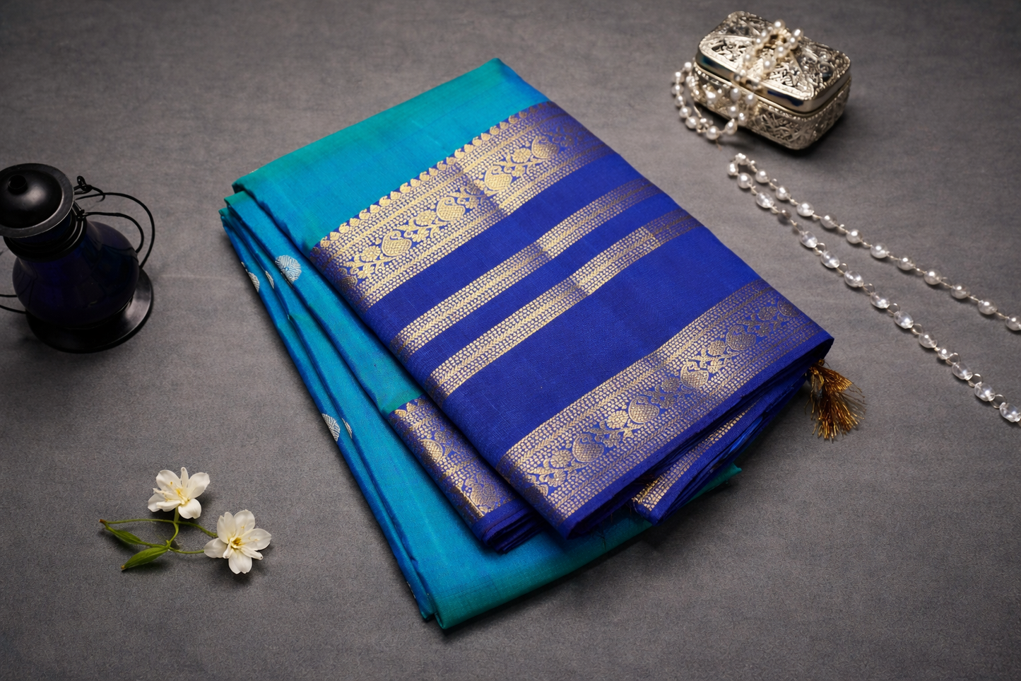 Elegant Blue Kanchipuram Silk Saree with Gold Zari Motifs and Royal Blue Border