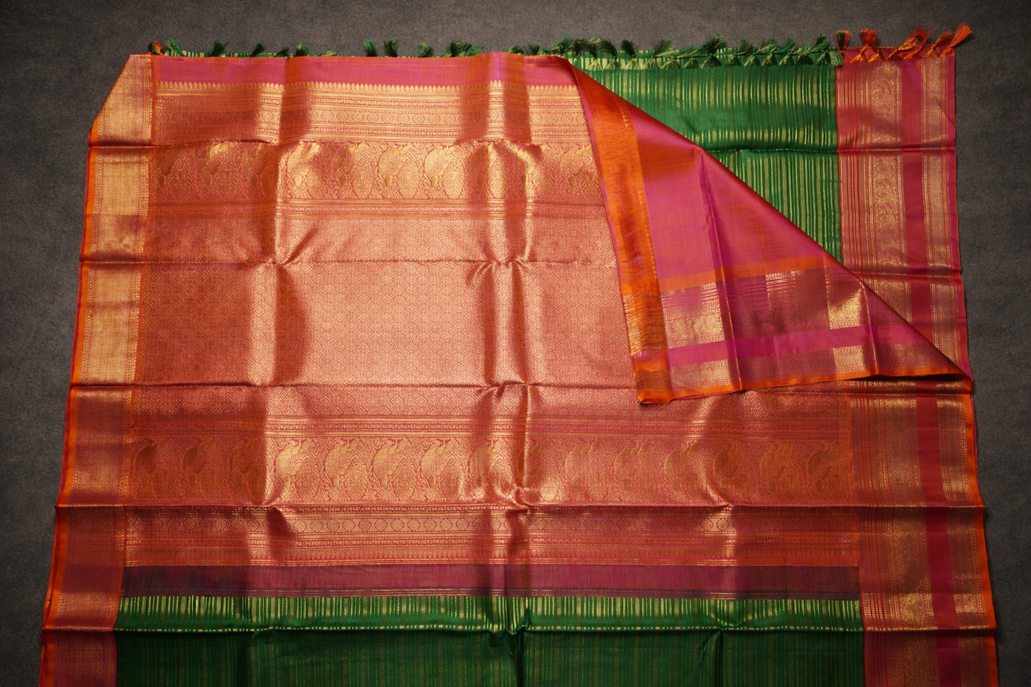 Traditional Green Kanchipuram Silk Saree with Pink Zari Border