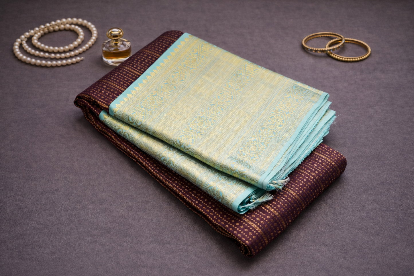 Elegant Maroon & Aqua Blue Silk Saree with Intricate Gold Zari Border