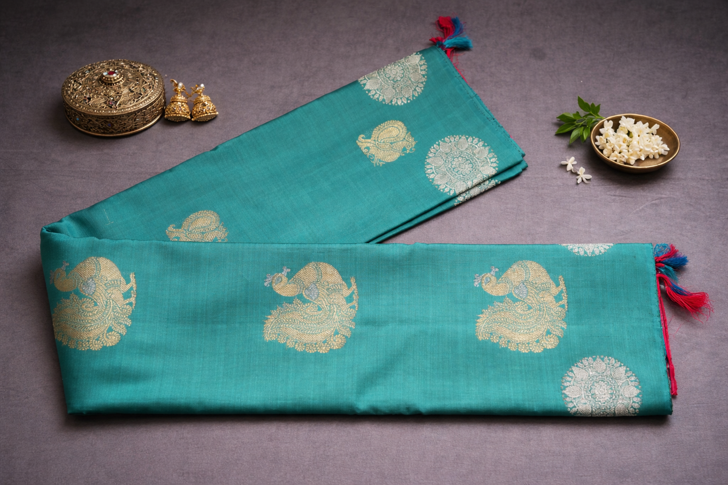 Vibrant Red Silk Saree with Teal Green Border and Gold Zari Motifs