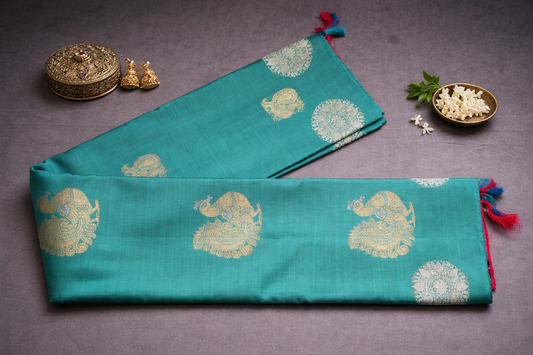 Vibrant Red Silk Saree with Teal Green Border and Gold Zari Motifs