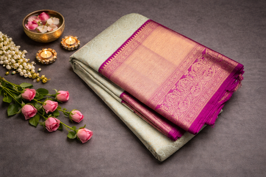 Pastel Mint Silk Saree with Magenta Zari Border